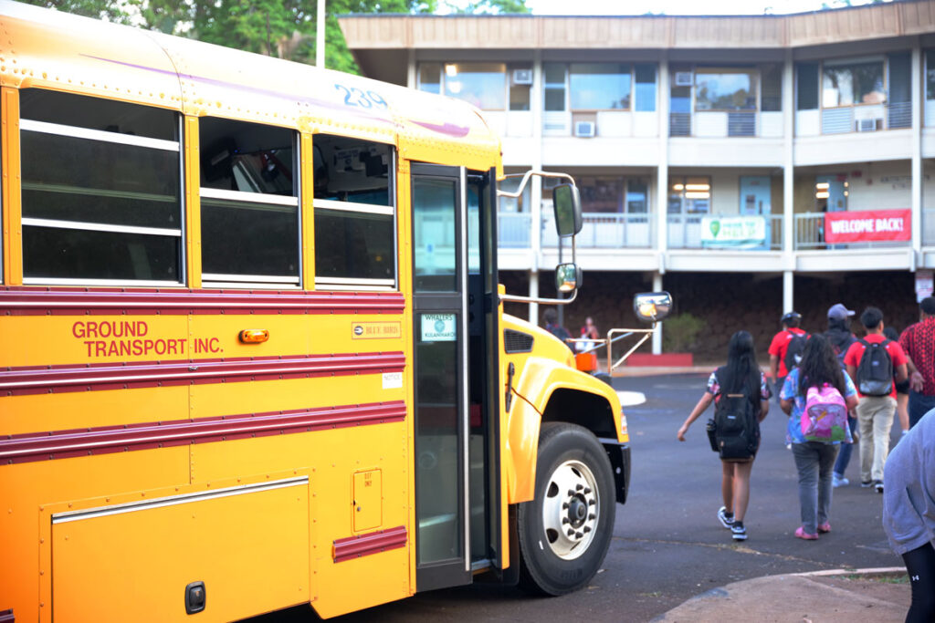 School bus in front of a school