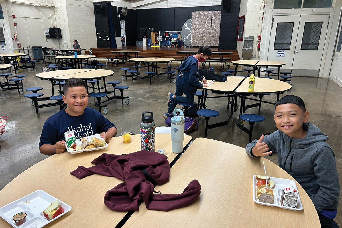 Two students enjoying breakfast