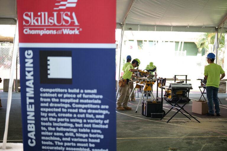 Students compete in cabinetmaking during their CTSO conference.