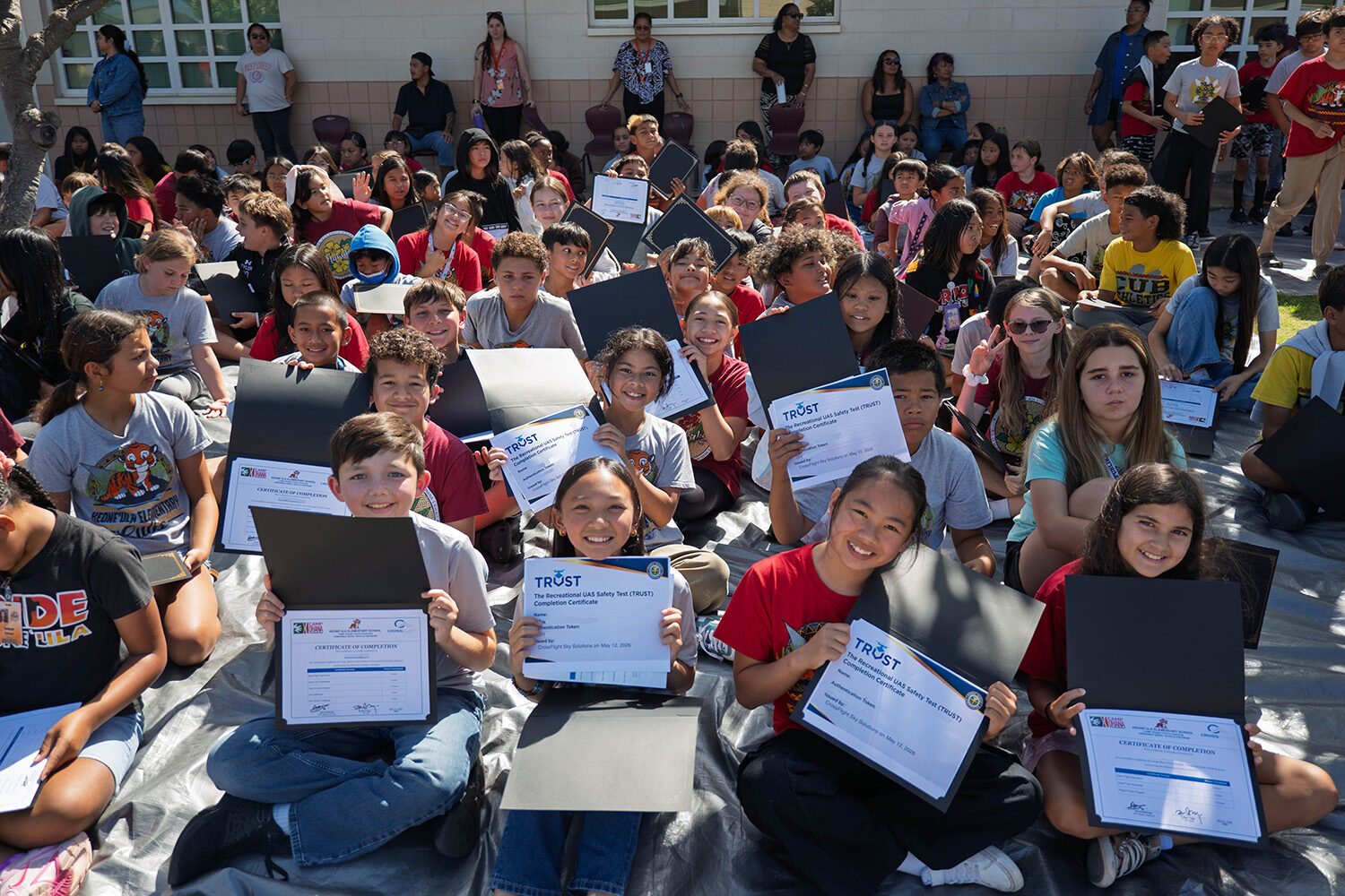Keoneʻula Elementary students were awarded FAA The Recreational UAS Safety Test Certification (TRUST) certificates to fly recreational drones (UAV) in designated FAA-approved airspaces.