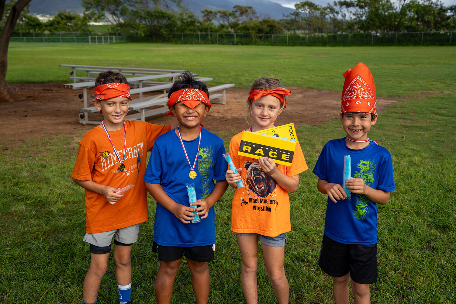 Pōmaikaʻi Elementary School students celebrate after winning The Amazing Race event.