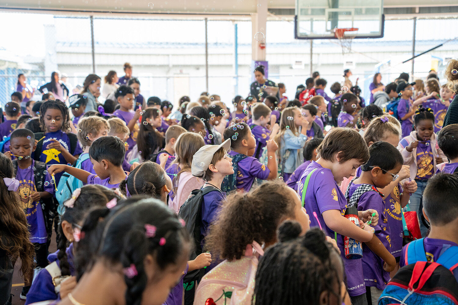 Solomon Elementary students blow bubbles to celebrate the Month of the Military Child.