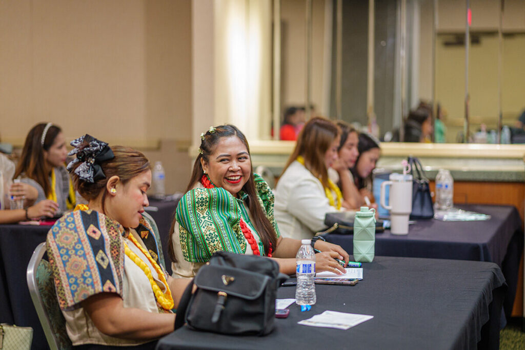 Members of the latest cohort of the J-1 Visa Teacher Program chat with each other.
