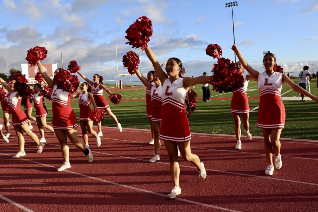 Cheerleaders at football game