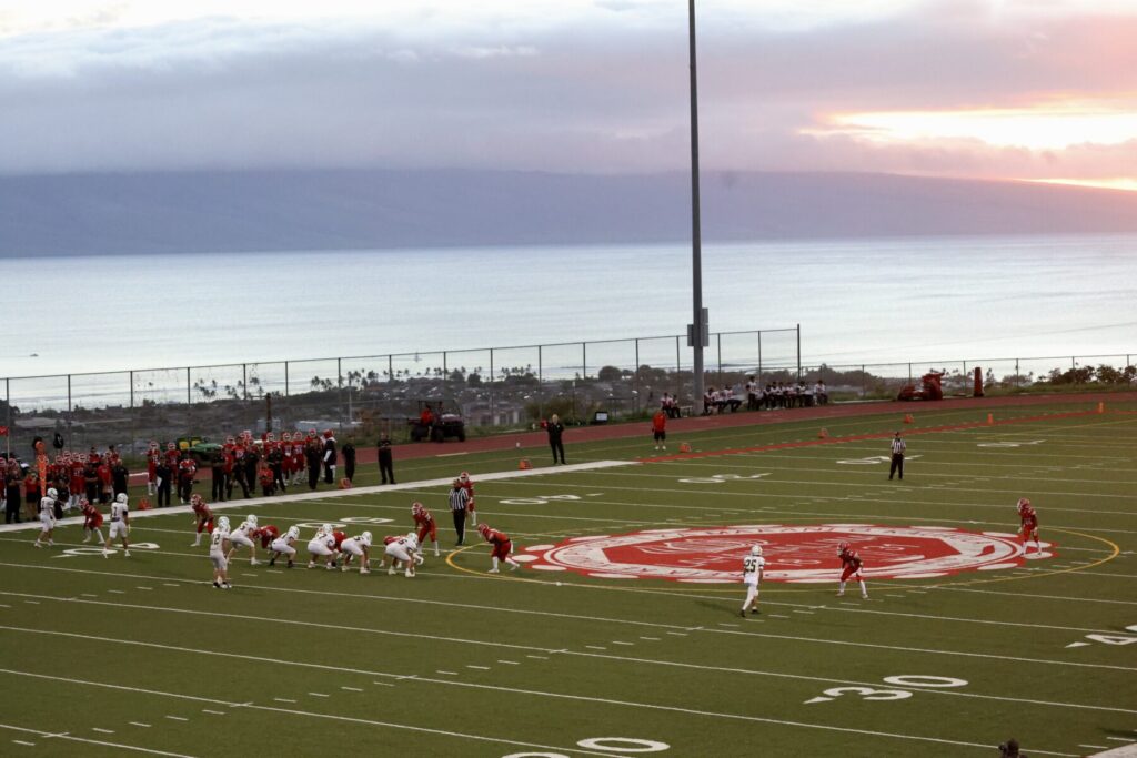 Players on football field
