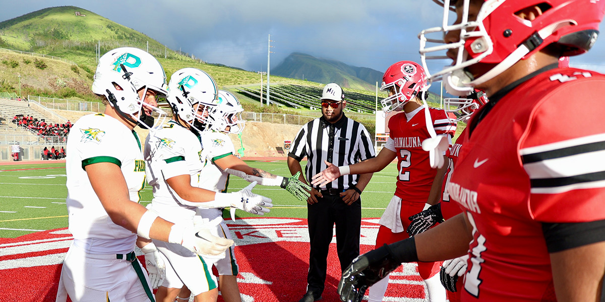 Football players shake hands