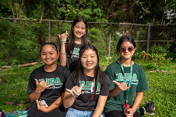 ‘Aiea Intermediate students smiled while flashing shakas.
