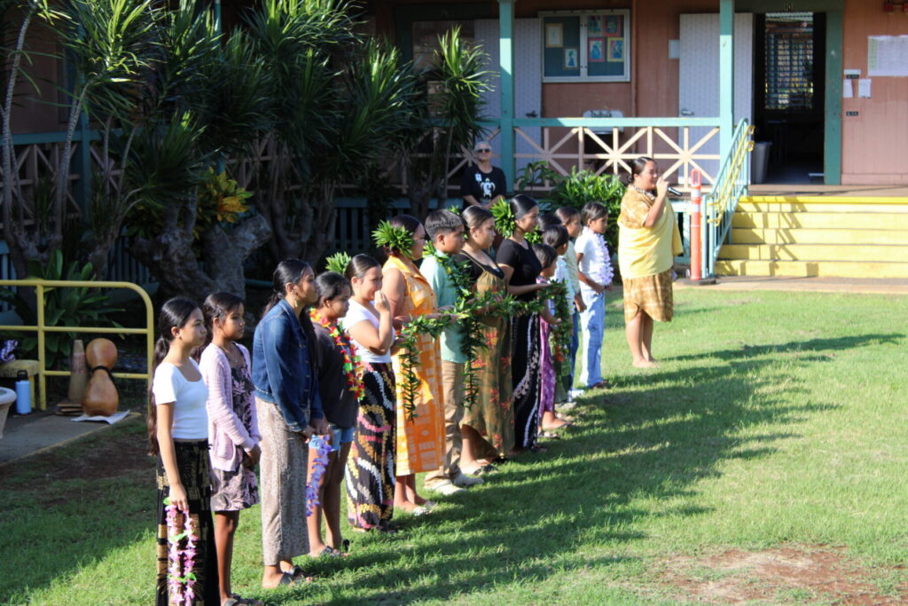 Students wearing lei