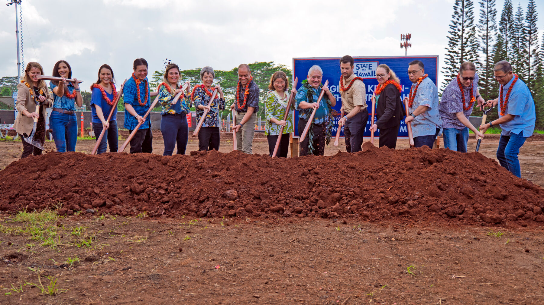 Photo of state and local officials breaking ground for the AINA Kitchen Network regional kitchen at a ceremony.