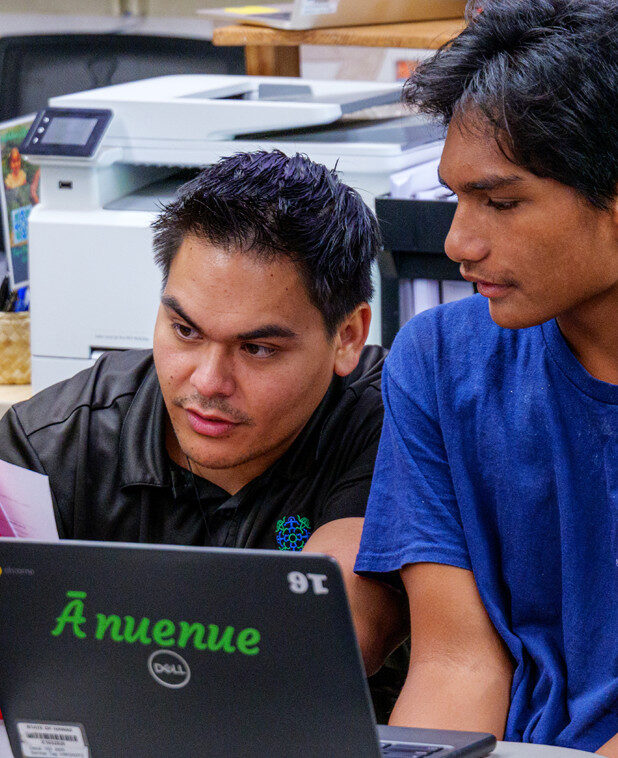 Anuenue teacher and high school student