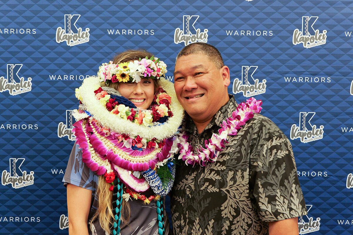 Kapolei Middle Schoolʻs Ashley Fuerst and Principal Daryl Agena take a photo together.