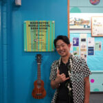 Jake Shimabukuro poses for a photo in the new Washington Middle School bandroom.