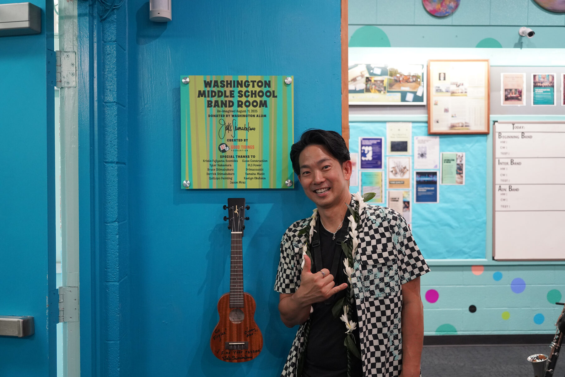 Jake Shimabukuro poses for a photo in the new Washington Middle School bandroom.