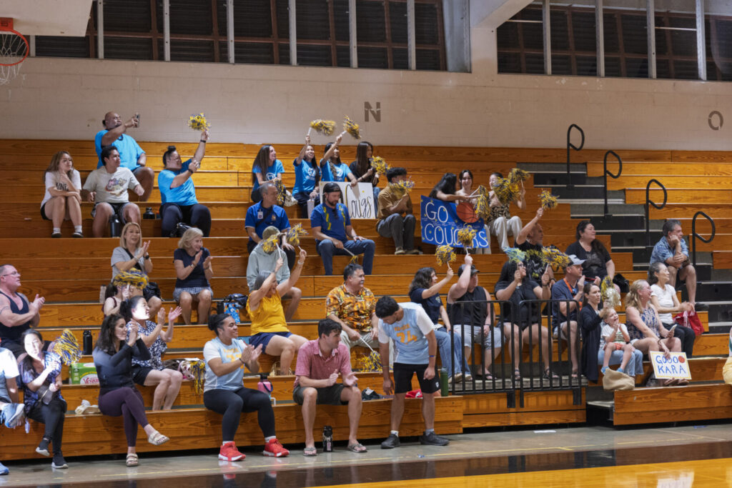 People sitting on bleachers