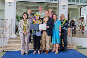 Susan Chew receives her award.