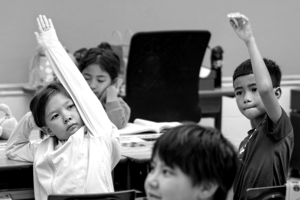Students raising hand