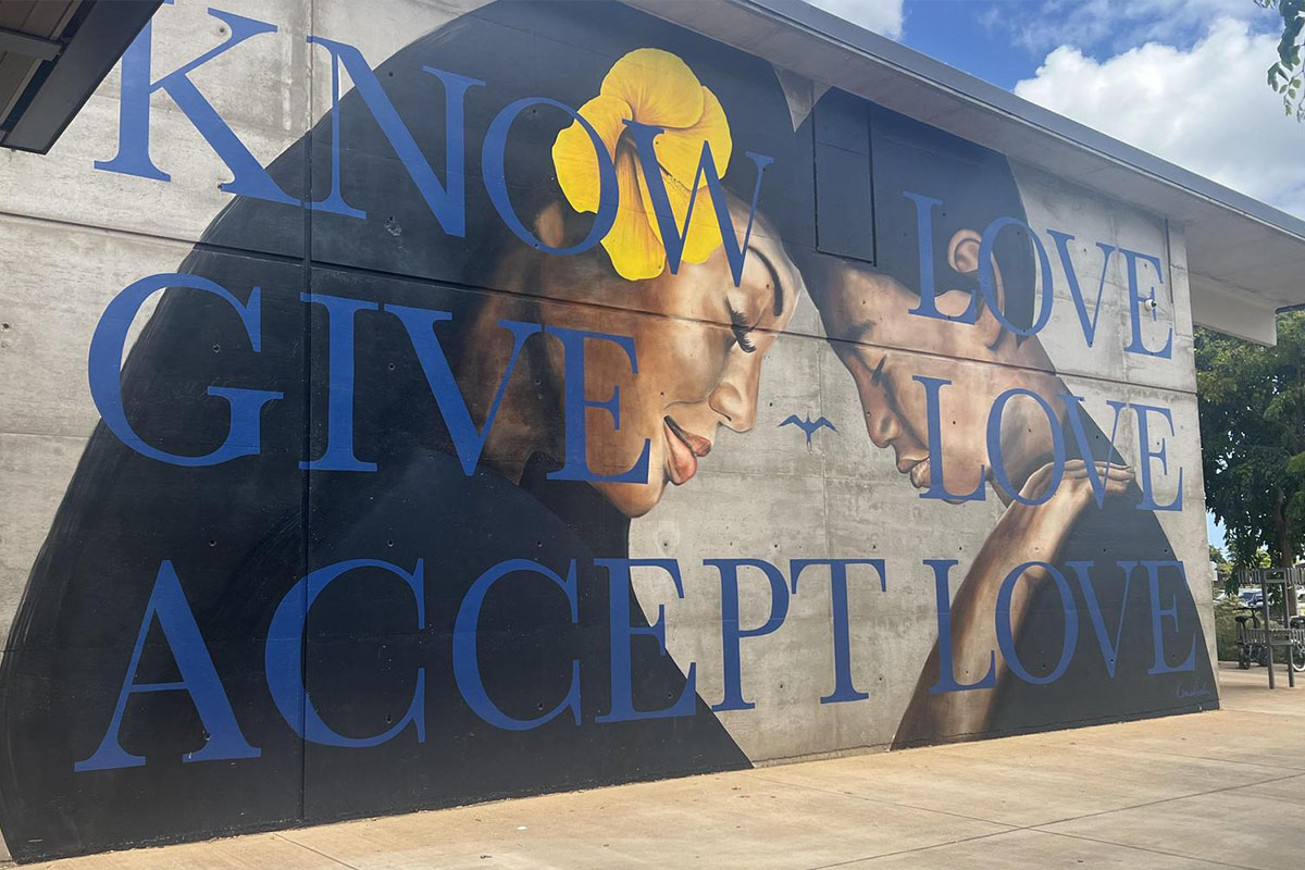 mural with the phrase know love give love accept love