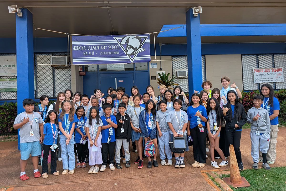 students in front of school