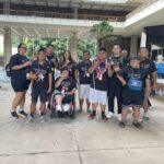 Students wear a shirt that says "Never back down" designed by Waipahu High School student Jayzen Carlos