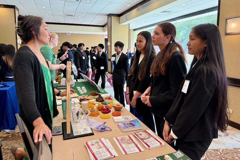 Students meet with a presenter during their CTSO competition.