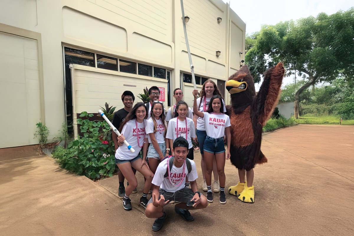 shot of students and school mascot