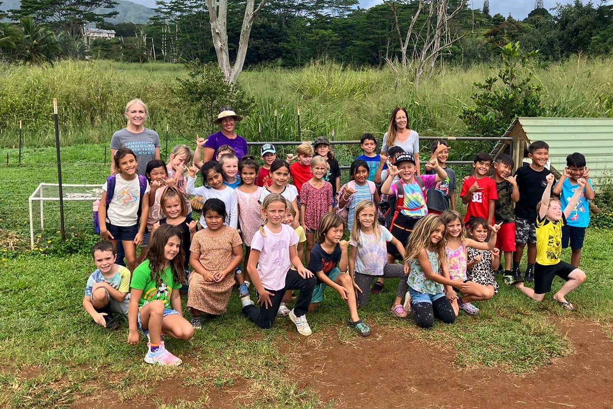 group shot of students and staff at Kauai Animal Education Farm