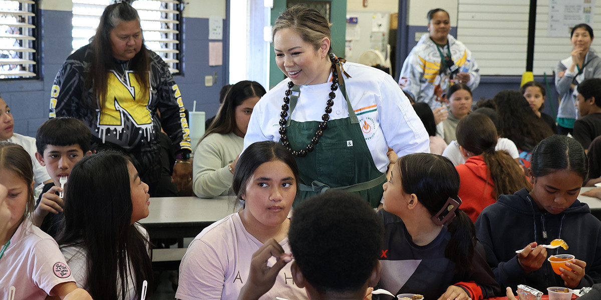 Chef smiles at students