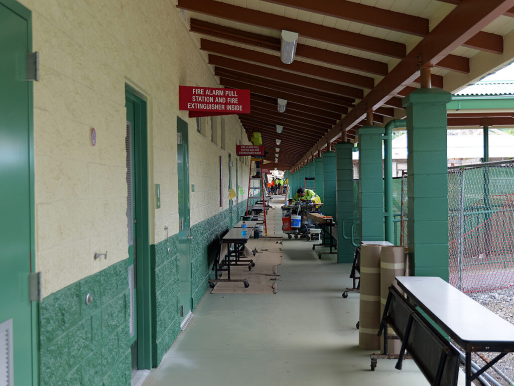 Contractors work at the new classroom building this summer.
