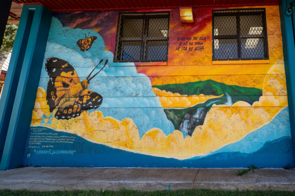 The endemic King Kamehameha pulelehua appeared on campus and on the mural